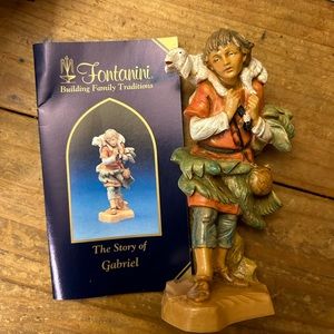Fontanini 5 inch nativity figurine. Gabriel with sheep.